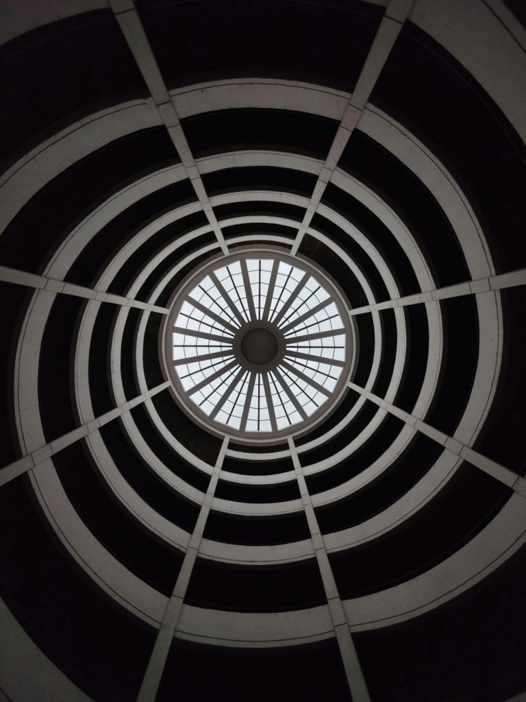 Mesmerizing view of the spiral dome in Hamburg's parking garage, showcasing geometric symmetry.