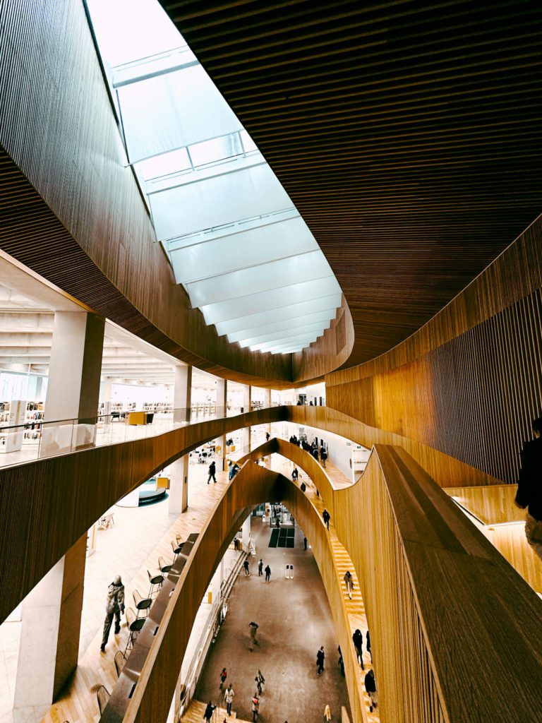 Modern architectural marvel showcasing the wooden atrium of Calgary Central Library.